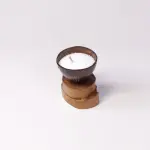Compact Coconut Shell Candle on Rustic Two-Tier Wood Slice Base