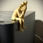 Sad Rick Sanchez Sitting on a Ledge Figurine
