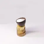 Coconut Shell Candle Bowl on Rustic Stacked Wood Base