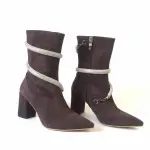 Boots with white belts wrap around it B-43