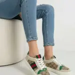Sneaker featuring signature side stripes SN-18