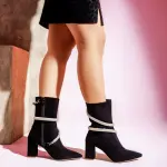 Boots with white belts wrap around it B-43